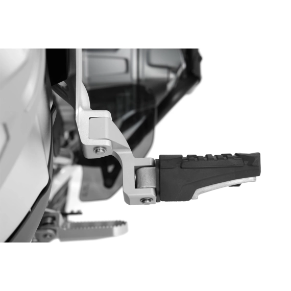 Passenger footrest relocation